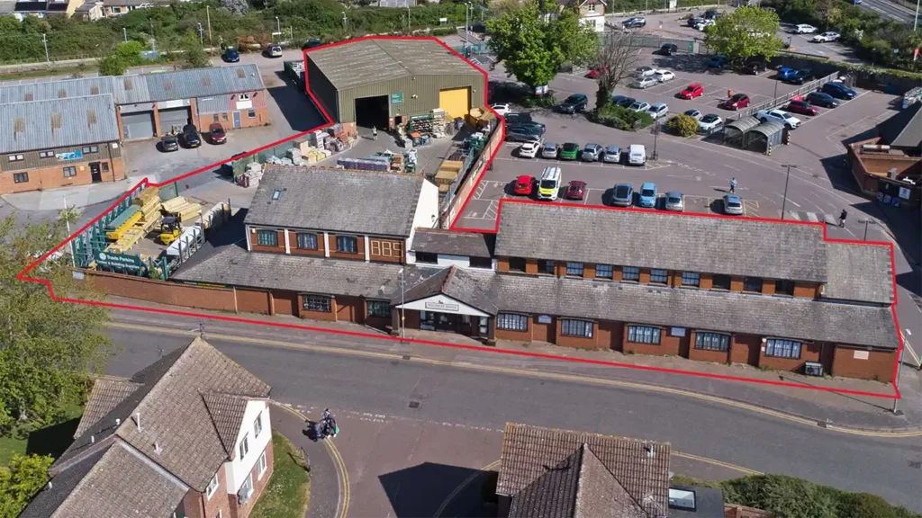 Aerial view of 0.46-acre commercial investment site featuring Mildmay House and Unit G